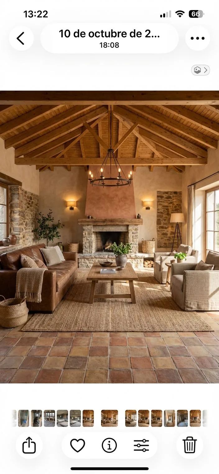 Rustic warm beige living room with exposed wooden beams, stone fireplace, terracotta tile floors, brown leather sofa, jute rug, photorealistic interior design photography, 8k