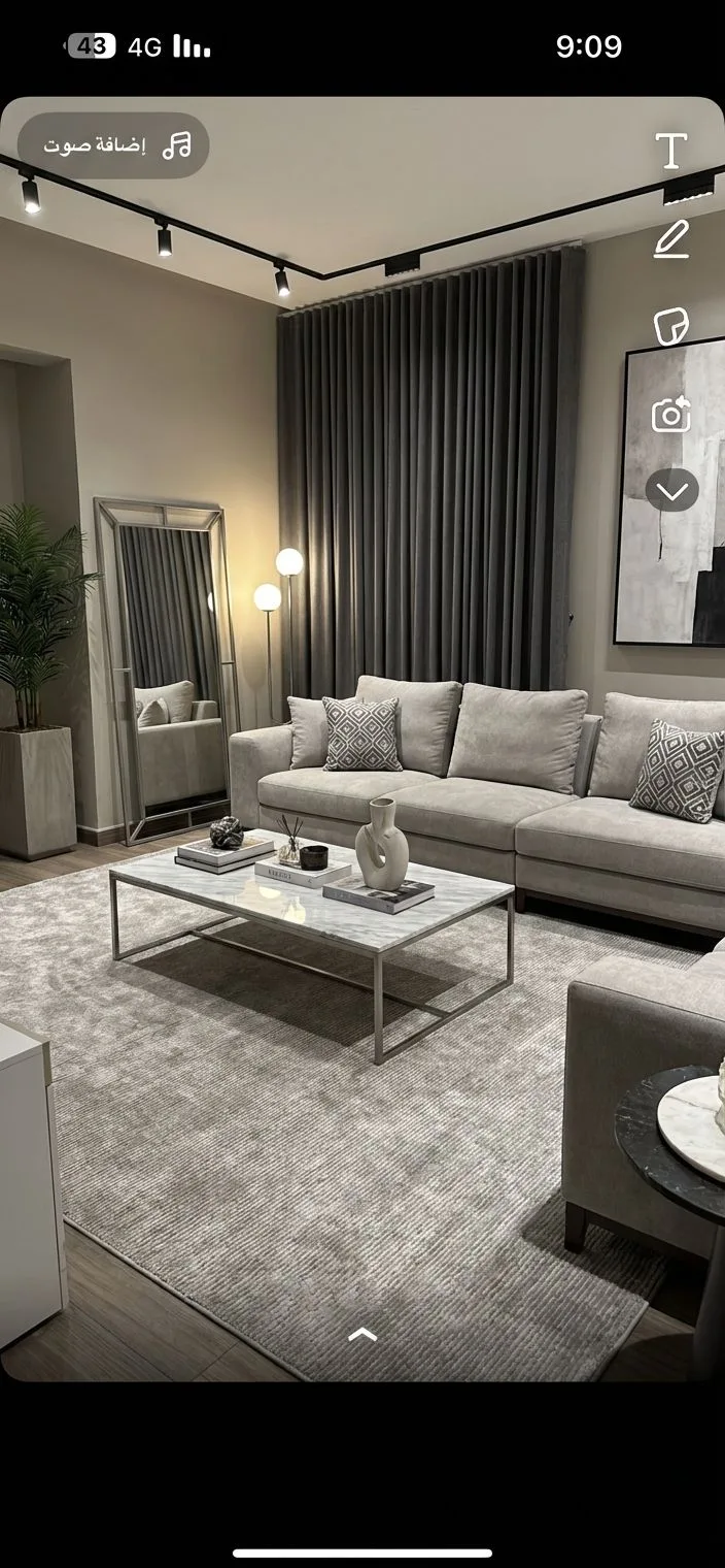 Contemporary grey living room with large sectional sofa, marble coffee table, floor to ceiling curtains, track lighting, full length mirror, photorealistic interior design photography, 8k